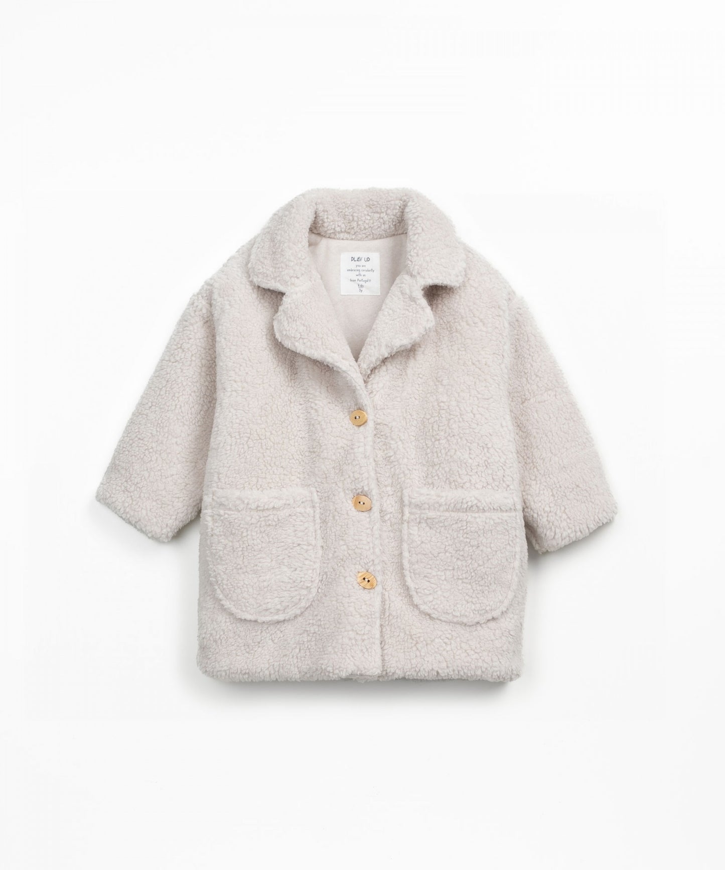 Cappotto in pelliccia con tasche