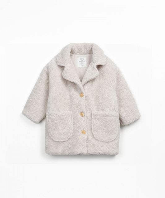 Cappotto in pelliccia con tasche